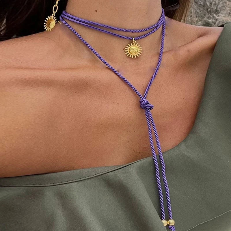 Collana sole viola