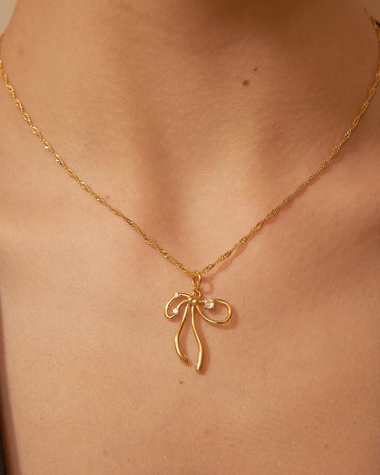 Collana con fiocco oro